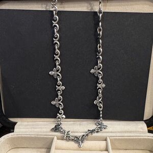 Elegant Silver Necklace with Floral Accents